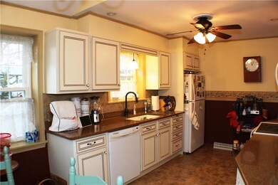 Eat-In area looking back, double sink, quartz coun