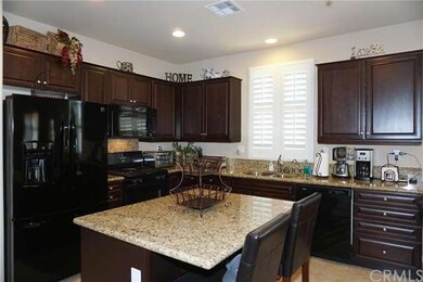 Fabulous kitchen with tile floors, big island, bre