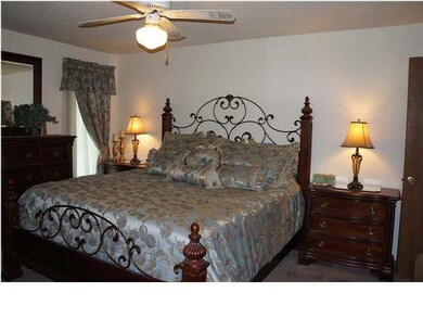 Master Bedroom With A Walk-In Closet and Master Ba