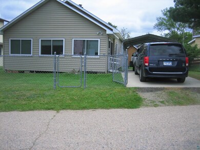 View of front of property with a front yard