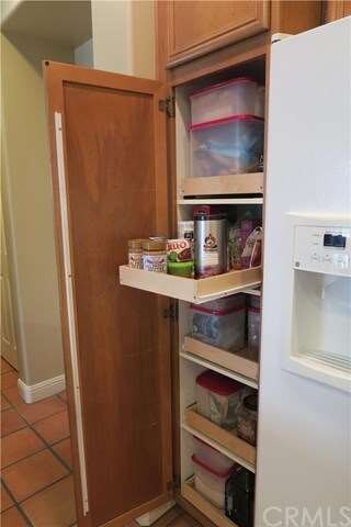 Convenient pull-out pantry shelving.