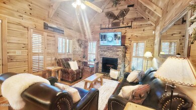 VAULTED LIVING AREA AND FIREPLACE