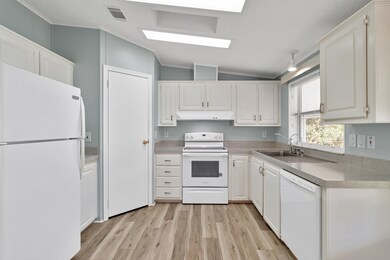 Kitchen with ample cabinetry and walk in pantry