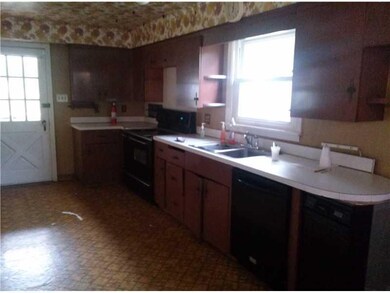 Kitchen. Very large eat in kitchen with stove, ref