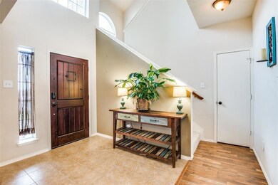 Open and airy entry with beautiful and stylish wood door, tile entry with extra natural light are the perfect space to welcome family and friends.