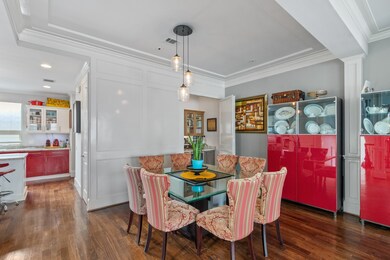 Spacious dining room between the kitchen and livin