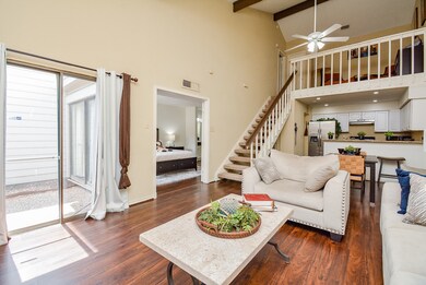 Living room opens to private patio and first floor