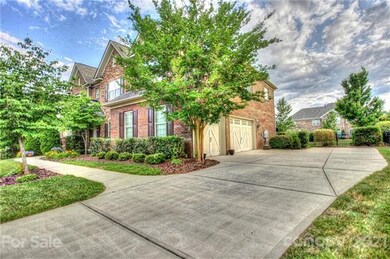 Side view of house with 3 car garage