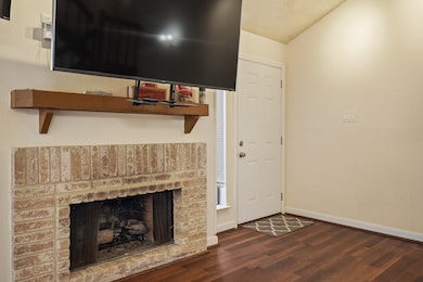 The inviting fireplace becomes a focal point that
