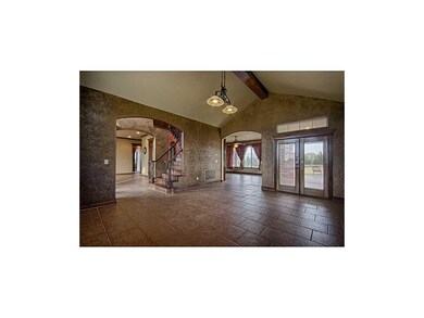 One of two living rooms that are downstairs.