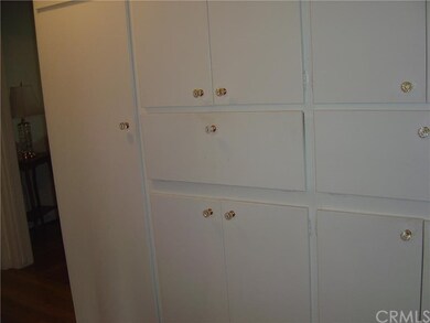 lots of cabinets down the 2nd hall way