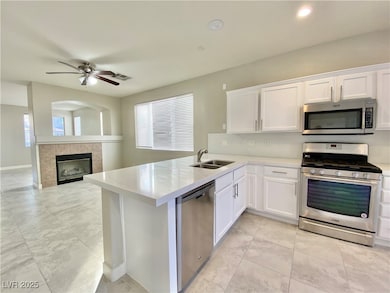 Kitchen featuring appliances with stainless steel