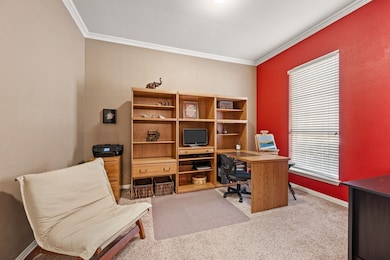 Dedicated Office has Crown Molding; French Doors (not shown)