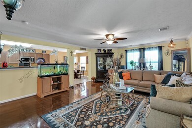 Plenty of space in this living room! Check out the beautiful tile!
