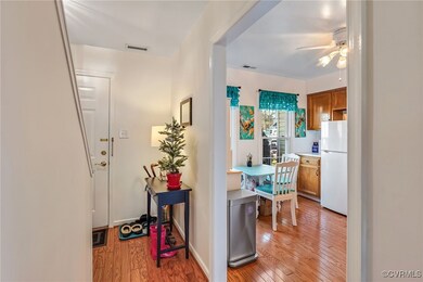 Hallway featuring light hardwood / wood-style floo