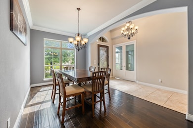 10x16 formal dining with beautiful crown molding,