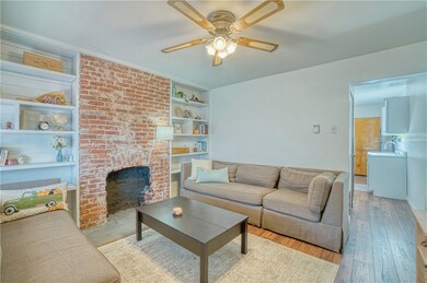 Reclaimed decorative fireplace and built in booksh