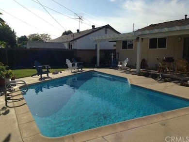 Sparkling Pool, Patio and Grass Area make this a w