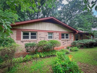 View of home's exterior featuring brick siding