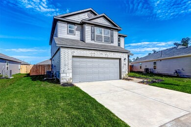 215 Bellewood Manor Dr, Magnolia, TX 77354 - photo 2