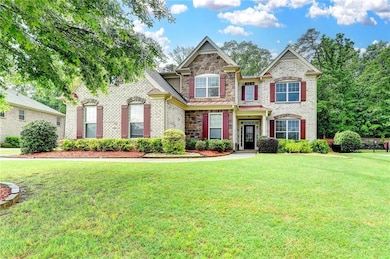 Craftsman house featuring brick siding, stone sidi