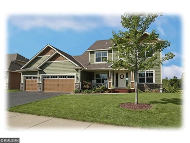 This grand two-story home is nestled on a pictures