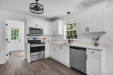Kitchen featuring appliances with stainless steel