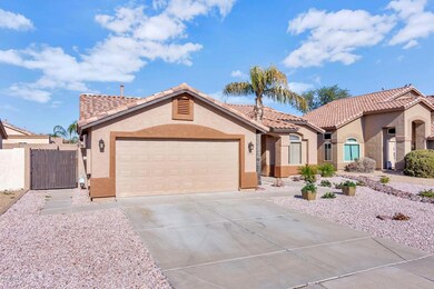 10772 W Louise Dr-large-002-24-Front Ext