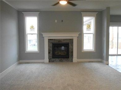 Great room with lots of windows.