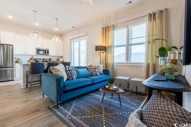 Living room featuring visible vents, a wealth of n