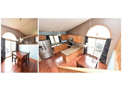 Main level dining area features walkout patio door