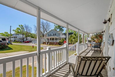 Balcony featuring a porch and a residential view