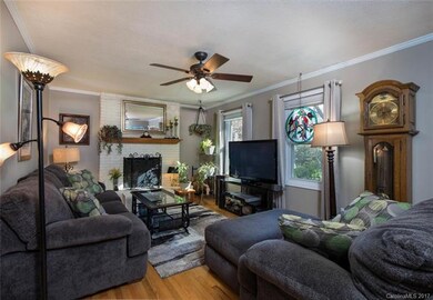 Living Room with wood burning Fireplace