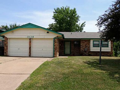 Exterior Front. Plenty of parking!  2 garage and r