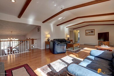 Huge living room with wood floors