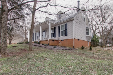 Mature trees surround the property.