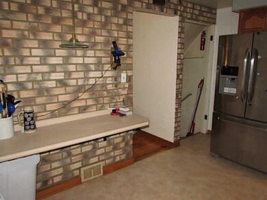 Kitchen. The Breakfast Bar can be used for informa