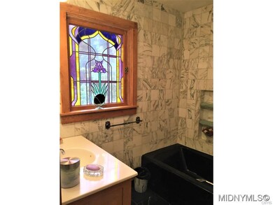Features a Stainglass Window