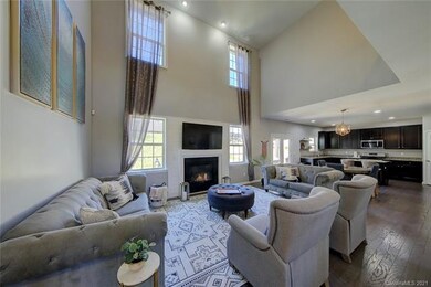 Two-story great room with natural gas fireplace
