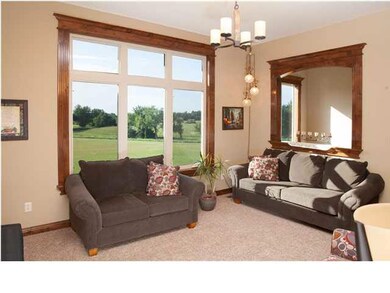 The living area awaits. The large window allows an