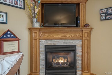 CUSTOM OAK MANTLE WITH STACKED STONE ACCENT AND NO