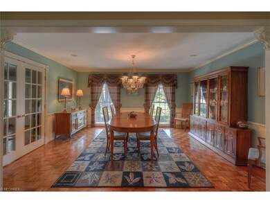 Very spacious dining room with floor to ceiling wi