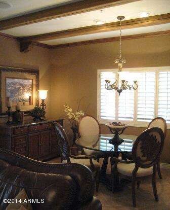 Formal Dining Area with Beamed Ceilings