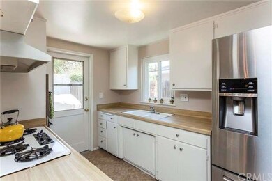 Kitchen with additional door access to the backyar