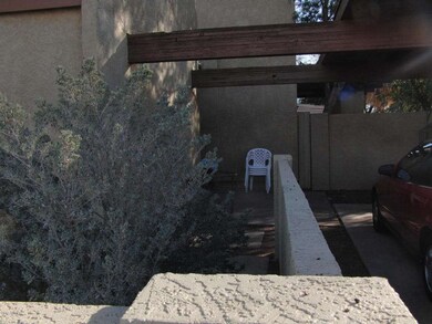 side of house and two car carport