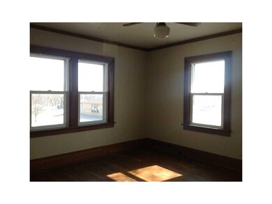 Bedroom. #2, natural wood floors. trim