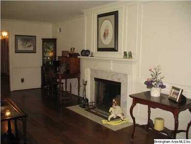 The formal living room has lots of natural light a
