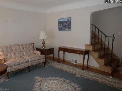 This view of the living room shows the warm feelin