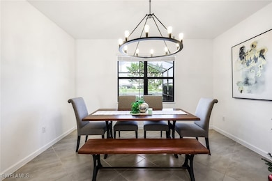Dining space featuring a notable chandelier