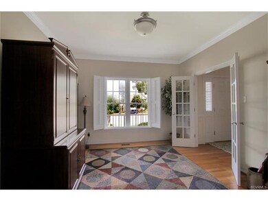 Office/Study with Hardwood Floors and French Doors